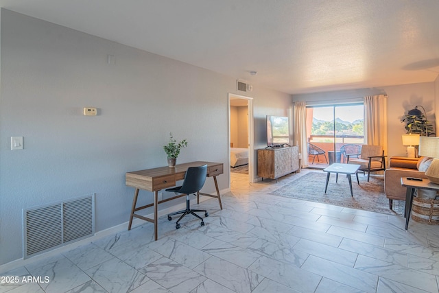 office area featuring marble finish floor, visible vents, and baseboards