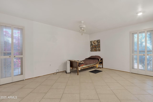 living area with light tile patterned floors