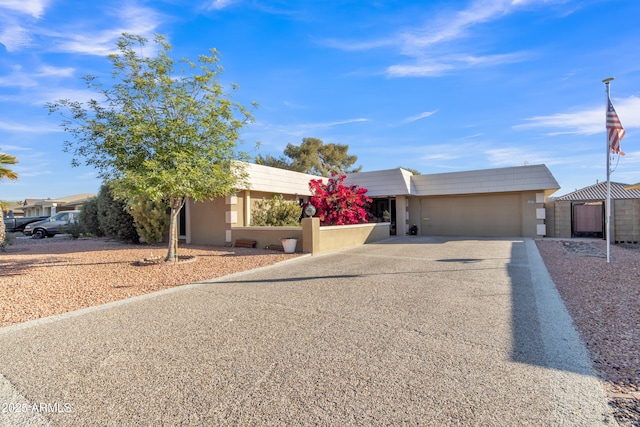 ranch-style house with a garage