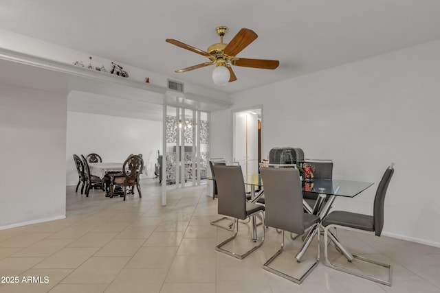 dining room featuring ceiling fan