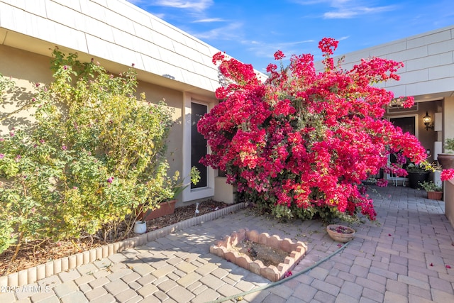 exterior space with a fire pit