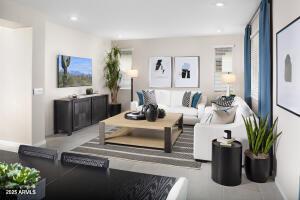 living room featuring baseboards and recessed lighting