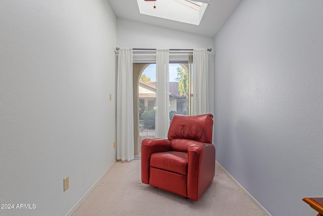 8140 N 107th Ave Unit 129, Peoria, AZ 85345 - sitting room with a skylight, vaulted ceiling, carpet floors, and baseboards
