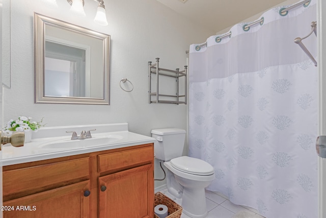 bathroom featuring tile patterned flooring, vanity, toilet, and a shower with shower curtain