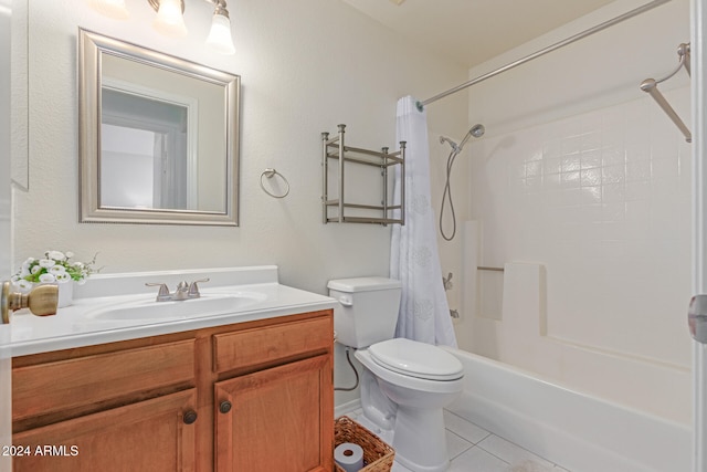 full bathroom with toilet, vanity, tile patterned floors, and shower / tub combo with curtain