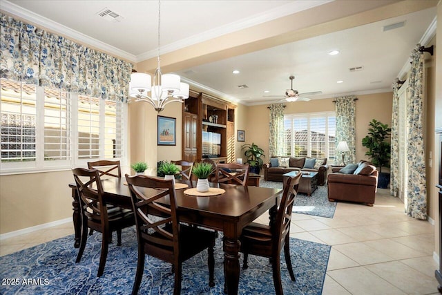 dining space featuring ornamental molding, visible vents, and light tile patterned floors