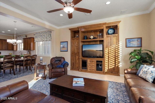 living room with light tile patterned floors, recessed lighting, crown molding, and ceiling fan with notable chandelier