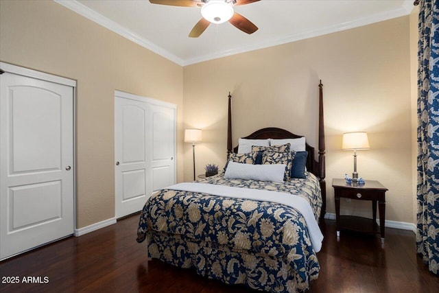 bedroom with ornamental molding, baseboards, and wood finished floors