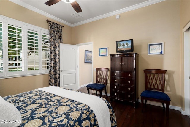 bedroom with visible vents, baseboards, a ceiling fan, wood finished floors, and crown molding