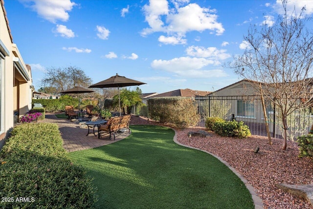 view of yard with a patio and fence