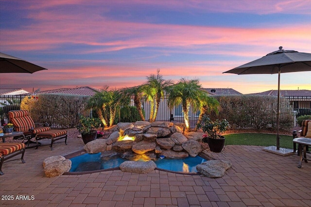 view of patio with fence