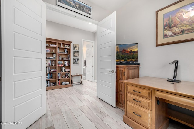 office space with light wood-style flooring