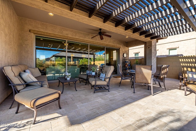 view of patio / terrace with a ceiling fan, a pergola, and an outdoor hangout area