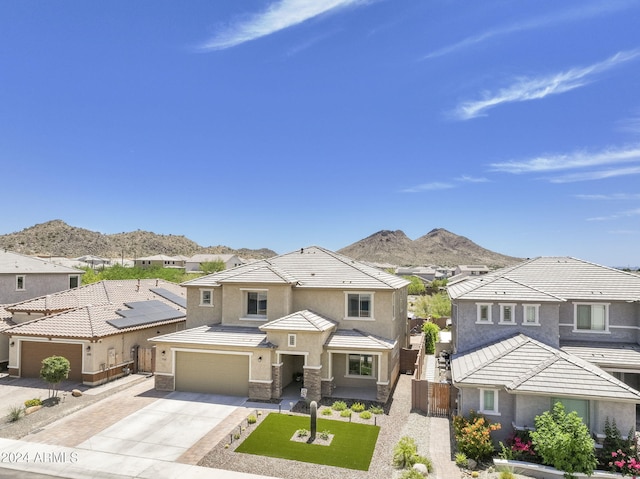 view of front of home featuring a mountain view