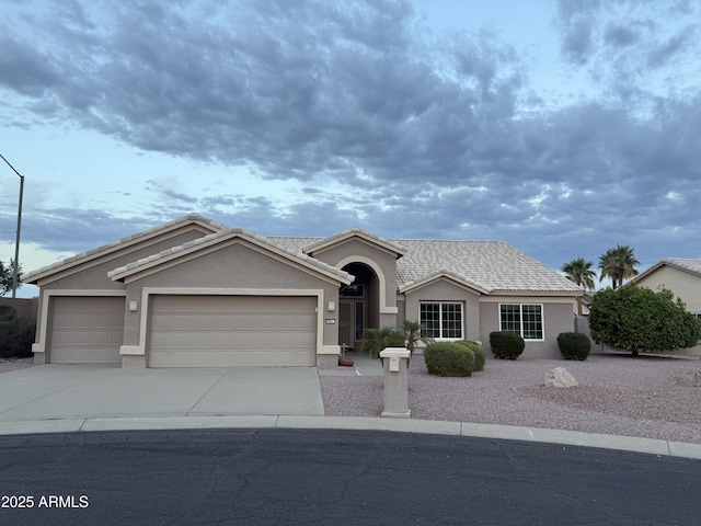 4081 N 156th Dr, Goodyear, AZ 85395 - ranch-style home with a garage, concrete driveway, stucco siding, and a tiled roof