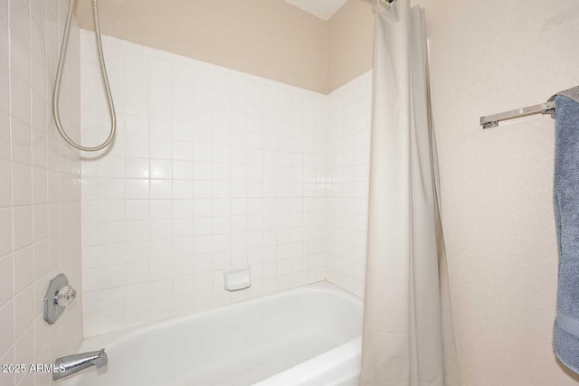 4081 N 156th Dr, Goodyear, AZ 85395 - bathroom featuring shower / bathtub combination with curtain