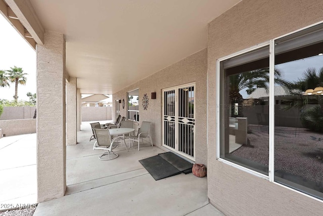 4081 N 156th Dr, Goodyear, AZ 85395 - view of patio / terrace with fence and outdoor dining space