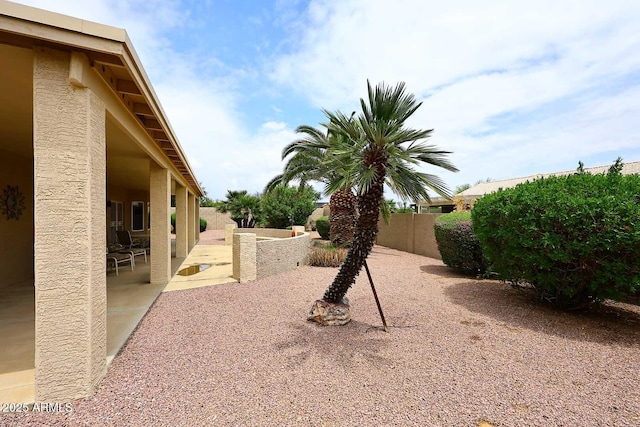 4081 N 156th Dr, Goodyear, AZ 85395 - fenced backyard with a patio area