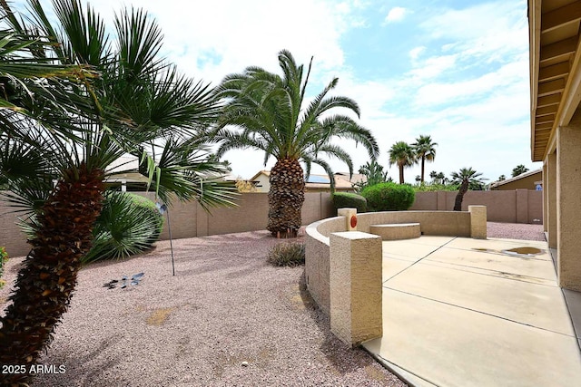 4081 N 156th Dr, Goodyear, AZ 85395 - fenced backyard featuring a patio area