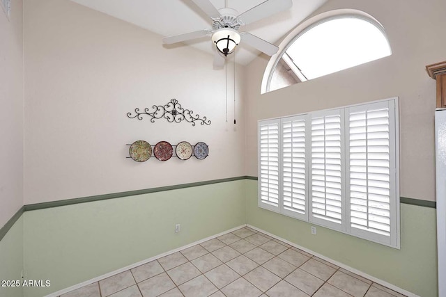 4081 N 156th Dr, Goodyear, AZ 85395 - spare room with a ceiling fan, baseboards, and light tile patterned floors