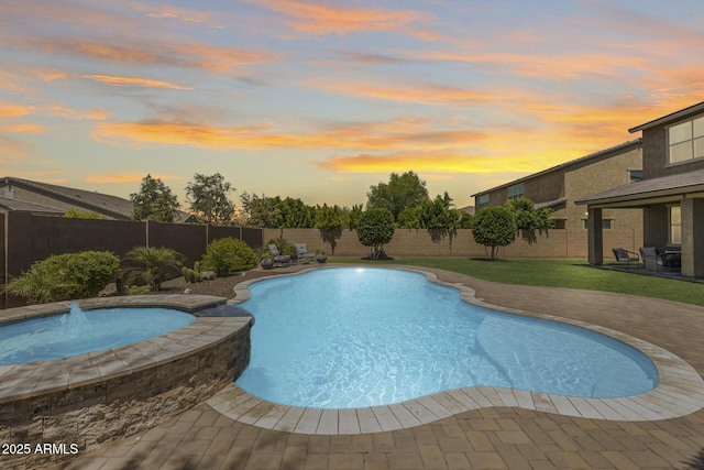 11875 W Lone Tree Trl, Peoria, AZ 85383 - view of pool with a fenced backyard, a patio, and a pool with connected hot tub
