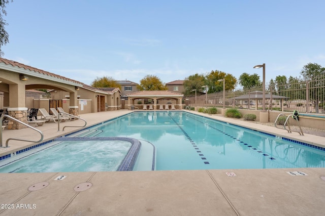 11875 W Lone Tree Trl, Peoria, AZ 85383 - community pool featuring a patio, a hot tub, and a gazebo
