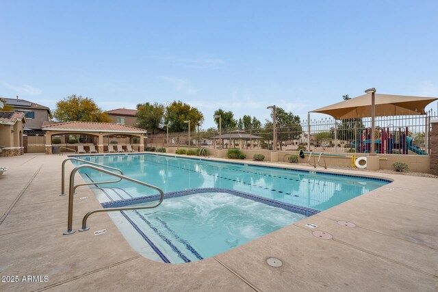 11875 W Lone Tree Trl, Peoria, AZ 85383 - community pool featuring a gazebo, a hot tub, and a patio