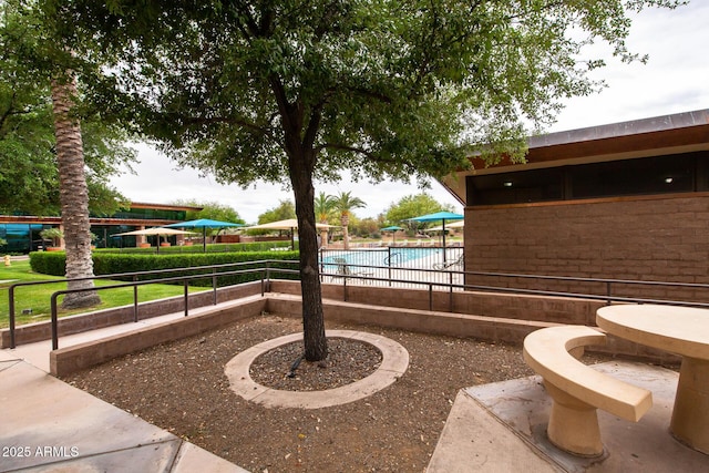 11875 W Lone Tree Trl, Peoria, AZ 85383 - view of patio with a community pool
