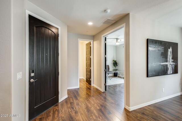 11875 W Lone Tree Trl, Peoria, AZ 85383 - foyer entrance with dark wood-style flooring and baseboards