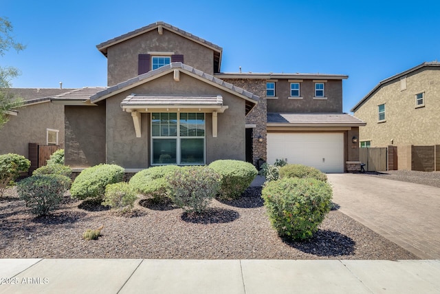 11875 W Lone Tree Trl, Peoria, AZ 85383 - view of front of house featuring stucco siding, a garage, and concrete driveway