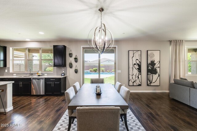 11875 W Lone Tree Trl, Peoria, AZ 85383 - dining area with a chandelier, dark wood finished floors, baseboards, and recessed lighting