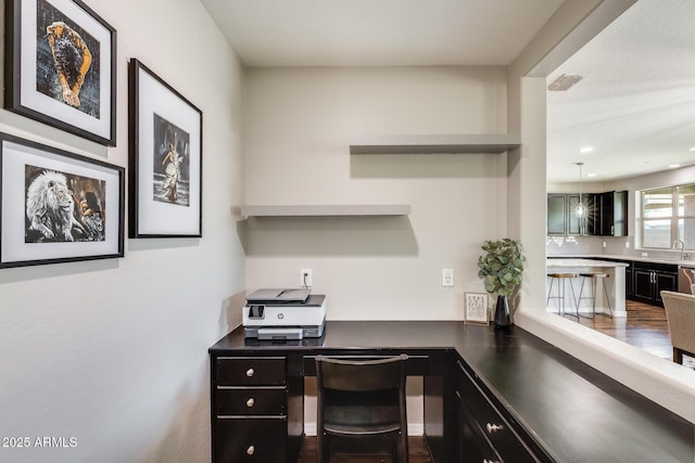 11875 W Lone Tree Trl, Peoria, AZ 85383 - office space with a sink and dark wood-style flooring