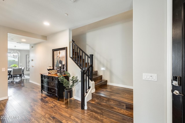 11875 W Lone Tree Trl, Peoria, AZ 85383 - staircase featuring wood finished floors, baseboards, a chandelier, and recessed lighting
