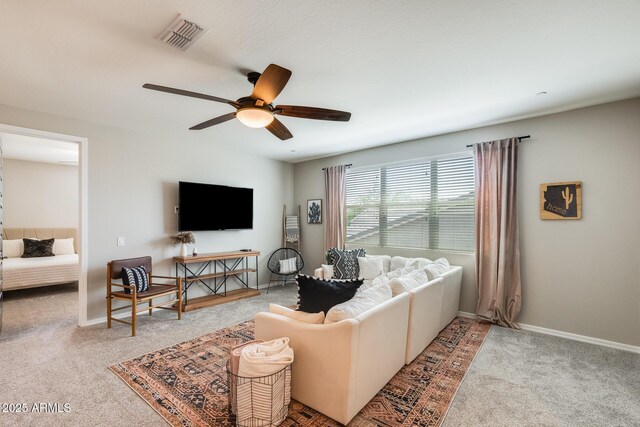 11875 W Lone Tree Trl, Peoria, AZ 85383 - living room featuring carpet floors, ceiling fan, and baseboards
