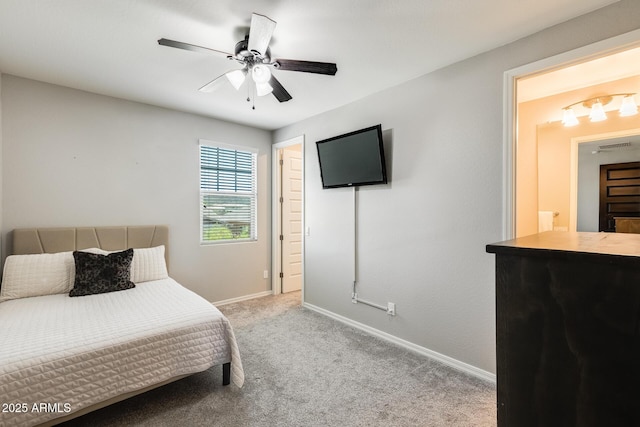 11875 W Lone Tree Trl, Peoria, AZ 85383 - carpeted bedroom with baseboards and a ceiling fan