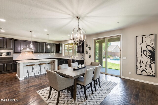 11875 W Lone Tree Trl, Peoria, AZ 85383 - dining room featuring a chandelier, dark wood finished floors, baseboards, and recessed lighting
