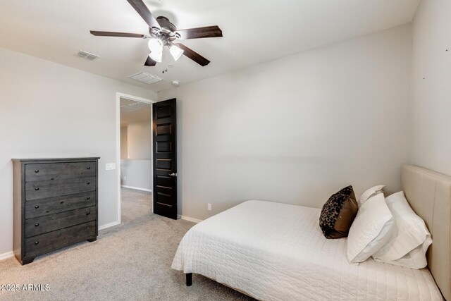 11875 W Lone Tree Trl, Peoria, AZ 85383 - bedroom with light carpet, baseboards, and a ceiling fan