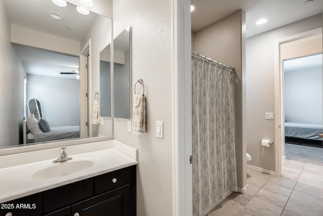 11875 W Lone Tree Trl, Peoria, AZ 85383 - full bathroom with connected bathroom, vanity, toilet, and tile patterned flooring