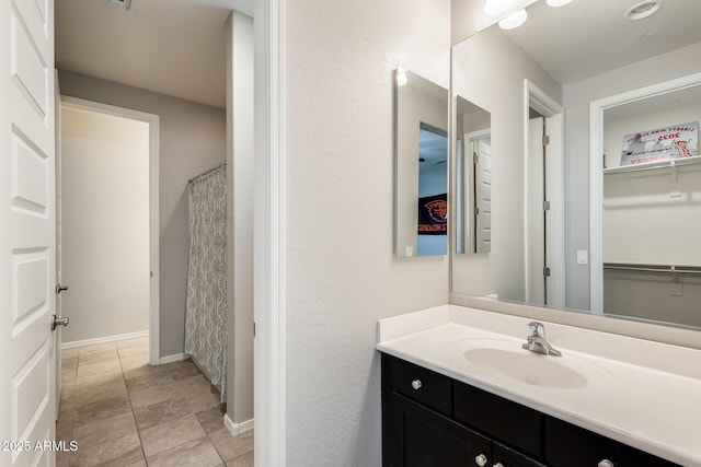 11875 W Lone Tree Trl, Peoria, AZ 85383 - full bath featuring vanity and baseboards