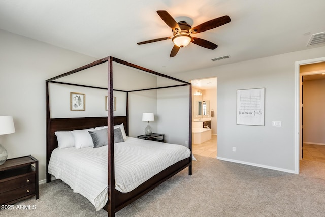 11875 W Lone Tree Trl, Peoria, AZ 85383 - bedroom with carpet flooring, baseboards, a ceiling fan, and connected bathroom