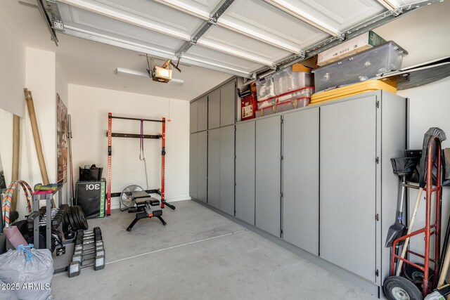 11875 W Lone Tree Trl, Peoria, AZ 85383 - garage featuring a garage door opener