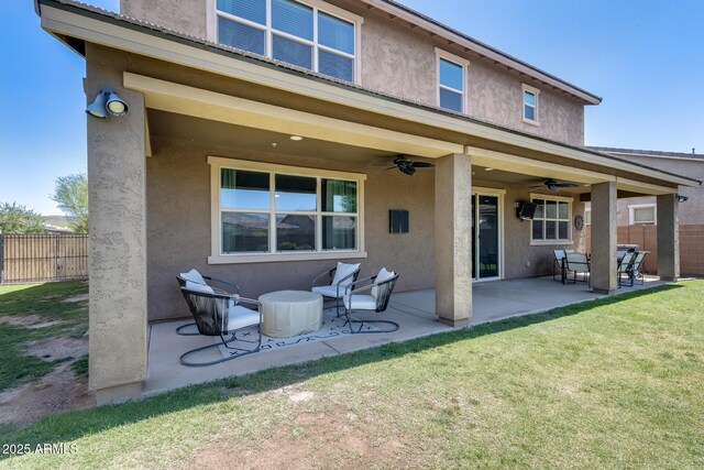 11875 W Lone Tree Trl, Peoria, AZ 85383 - rear view of property with stucco siding, a ceiling fan, and a patio area
