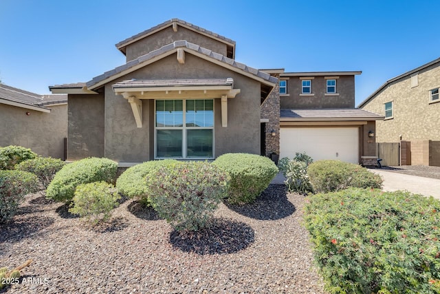 11875 W Lone Tree Trl, Peoria, AZ 85383 - view of front of house with stucco siding, concrete driveway, and an attached garage