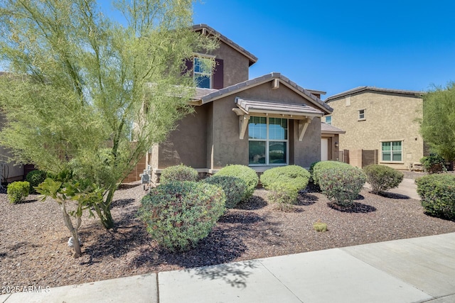 11875 W Lone Tree Trl, Peoria, AZ 85383 - view of front of house with stucco siding and a tiled roof