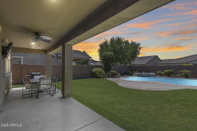 11875 W Lone Tree Trl, Peoria, AZ 85383 - view of patio / terrace with a ceiling fan, outdoor dining area, and a pool with connected hot tub
