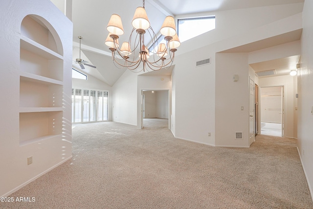 empty room featuring light carpet, ceiling fan with notable chandelier, built in features, and high vaulted ceiling