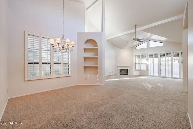 unfurnished living room with plenty of natural light, high vaulted ceiling, carpet, ceiling fan with notable chandelier, and beamed ceiling