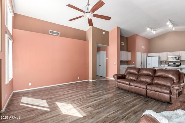 1631 E Carla Vista Dr, Chandler, AZ 85225 - living room featuring track lighting, visible vents, ceiling fan, high vaulted ceiling, and wood finished floors