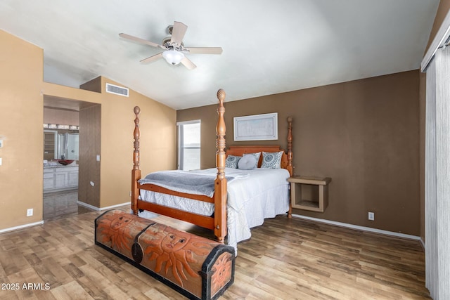 1631 E Carla Vista Dr, Chandler, AZ 85225 - bedroom featuring ensuite bath, vaulted ceiling, visible vents, wood finished floors, and baseboards