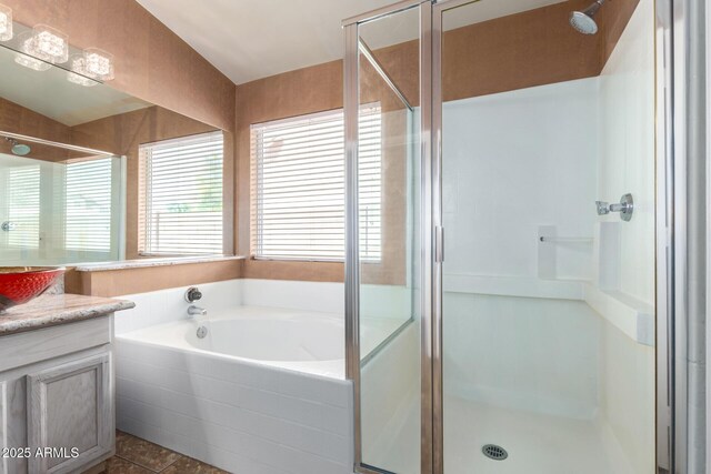 1631 E Carla Vista Dr, Chandler, AZ 85225 - bathroom featuring tile patterned floors, a garden tub, a stall shower, and vanity